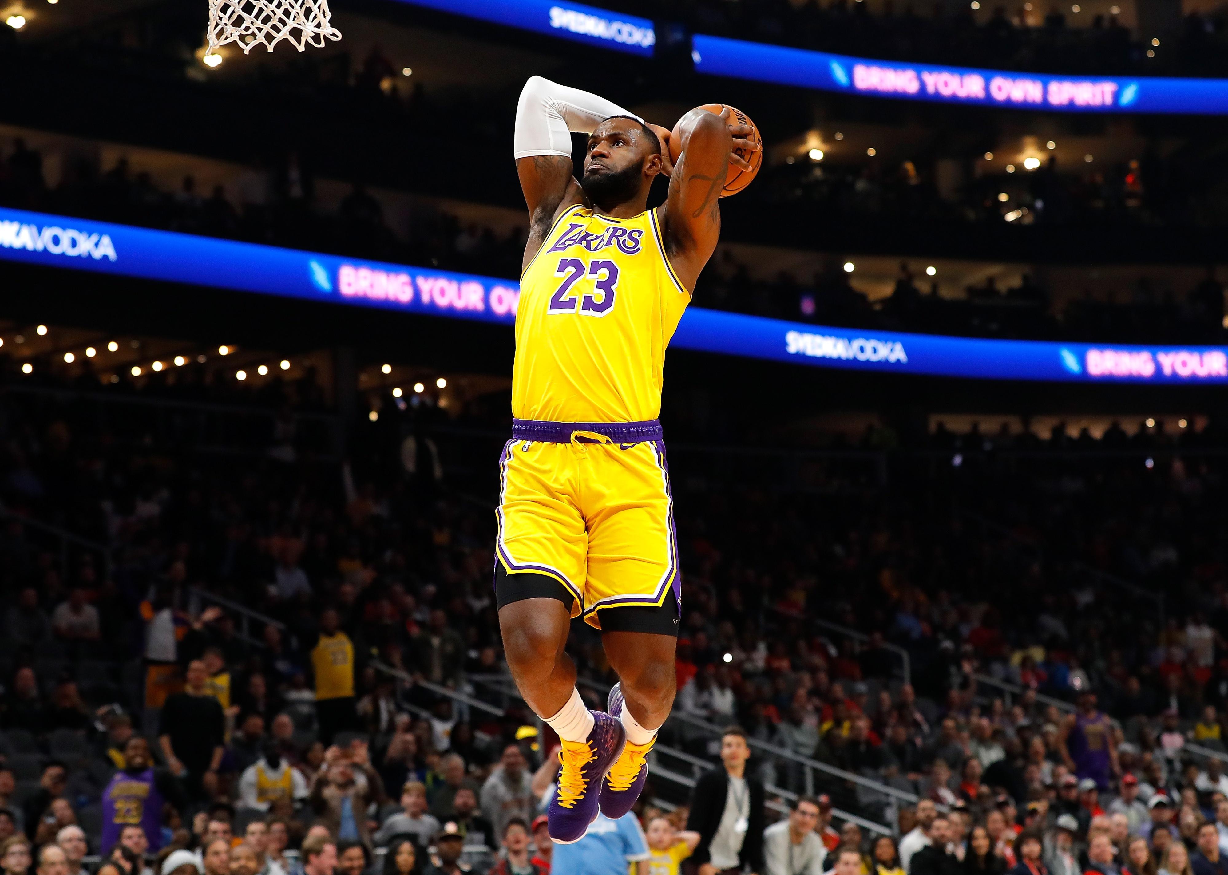 LeBron James of the Los Angeles Lakers dunks against the Atlanta Hawks