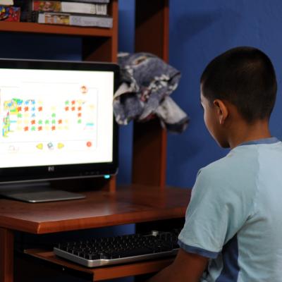  Boy playing educational computer game