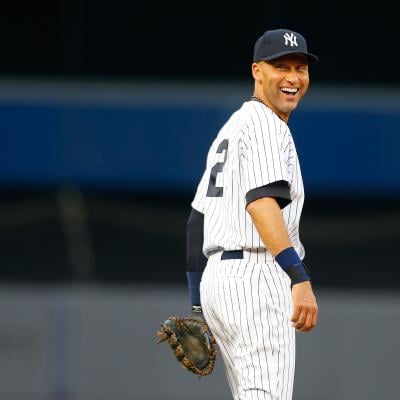 Derek Jeter #2 of the New York Yankees smiles during a game.