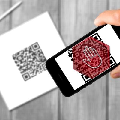 QR code scan with stop symbol on it.