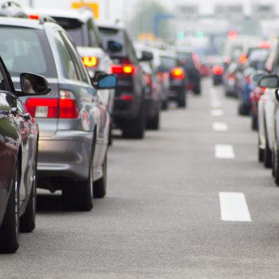 Cars on highway in traffic jam.