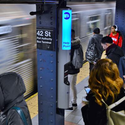 Rush hour commuters using NYC 42 Street Port Authority Transportation.