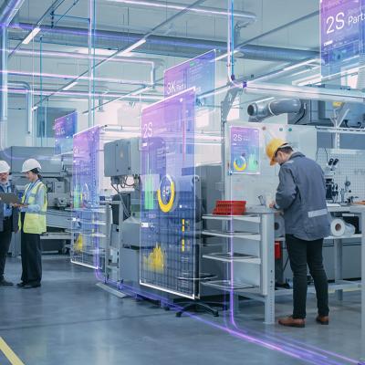 A factory optimizes digitalization where workers are working on high-tech equipment.