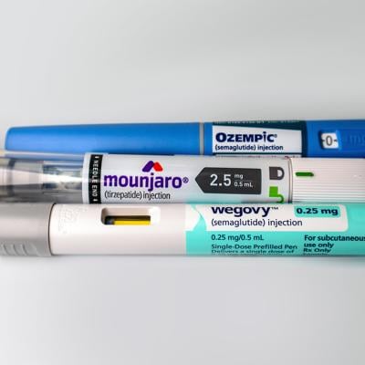 Mounjaro, Ozempic and Wegovy pens on a white background.