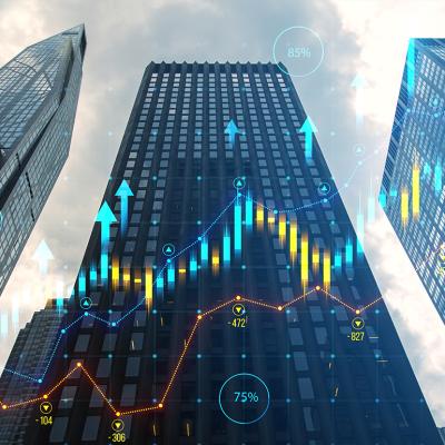 Skyscrapers illustrated with financial charts overlay.