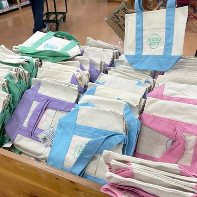 The viral Trader Joes mini pastel canvas tote bags for sale.