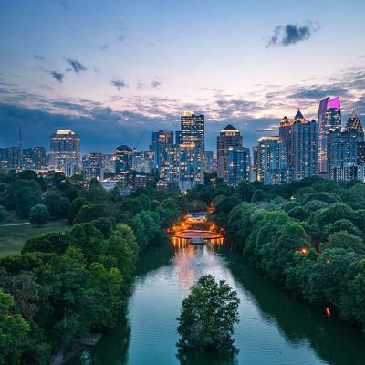 Atlanta, Georgia, USA overlooking Piedmont Park at dusk.
