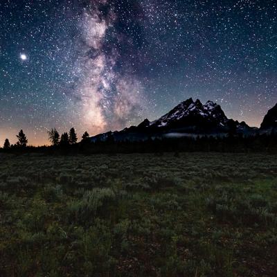 View of nighttime sky and stars from Grand Teton National Park near Jackson Hole, Wyoming.