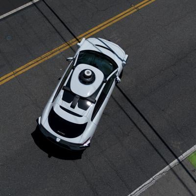 An aerial view of a Waymo vehicle on a street in Santa Monica, California.