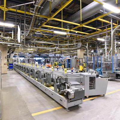 A large printing business for newspapers and magazines and their paper rolls and offset printing machines.