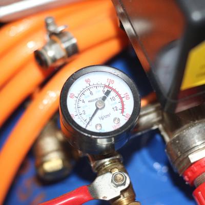 The pressure gauge of an air compressor.