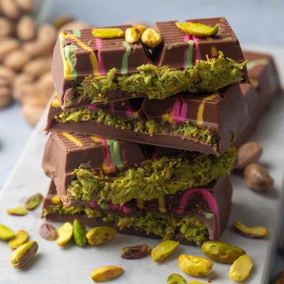 Bars of the trending Dubai chocolate with pistachio paste and kataifi dough.