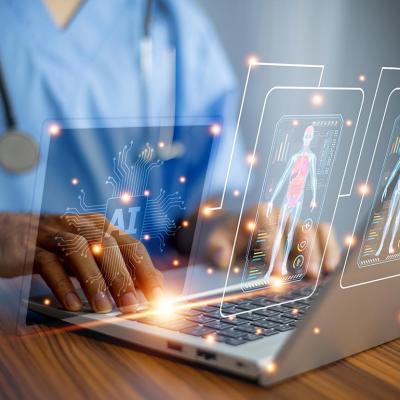 Medical professional using laptop with images symbolizing the use of AI overlaid on top.