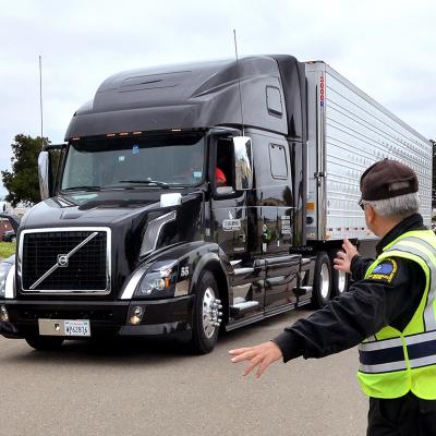 A big rig being pulled over by inspectors during a surprise inspection in Santa Monica, California.