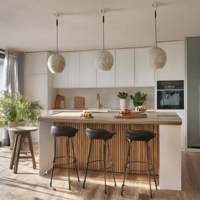 A stylish modern interior of a home kitchen.