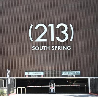 City area code "213" in South Spring on the LA Times parking garage facing Broadway in Los Angeles, California.
