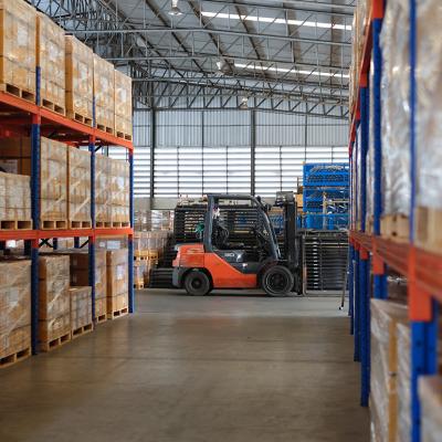 Interior of a modern auto parts factory or warehouse.