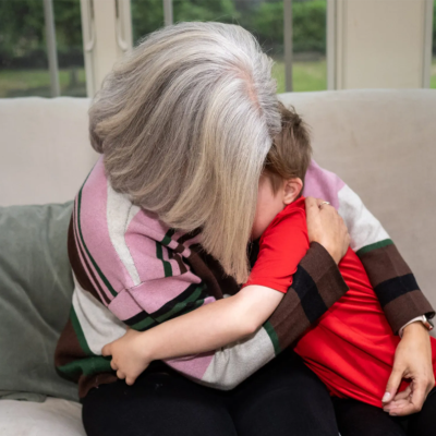 Terri Joyce hugging her son.