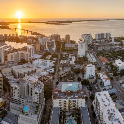 Aerial view of a downtown real estate development in Sarasota City in Florida during sunset.