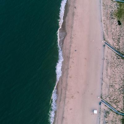 An aerial sunset view of Dewey Beach in Lewes, Delaware.
