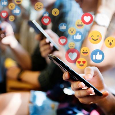 People using their phones on public transport illustrated with social media graphics.