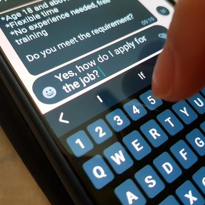 A person asks how to apply as a response to a job offer via SMS.
