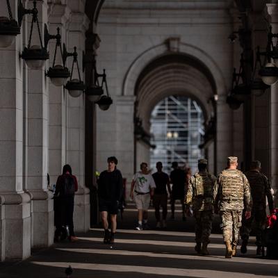 Members of the National Guard and members of Federal Law Enforcement Agencies stand outside the main hall of Union Station in Washington, D.C.