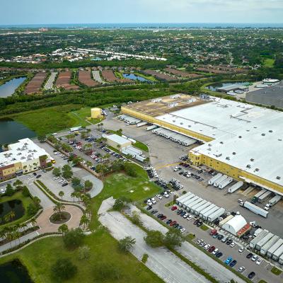 Aerial view of large commercial loading bay for delivery trucks in Sarasota, Florida.