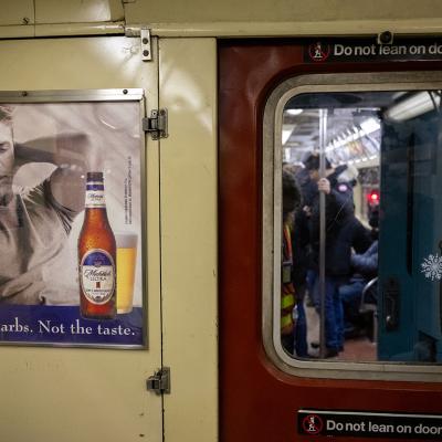 An beer brand ad displayed in a Holiday Nostalgia train in New York City.