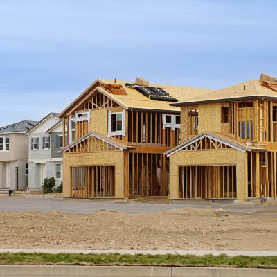 A row of finished homes and a few still under construction.