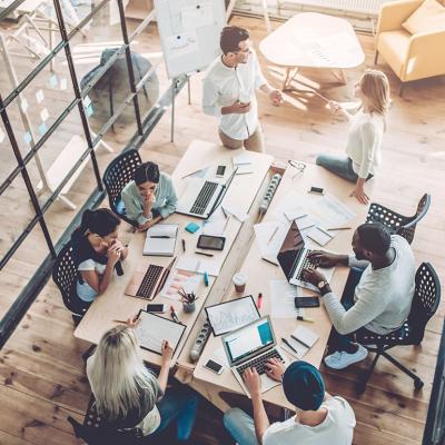 High-angle view of a creative business team in a meeting.