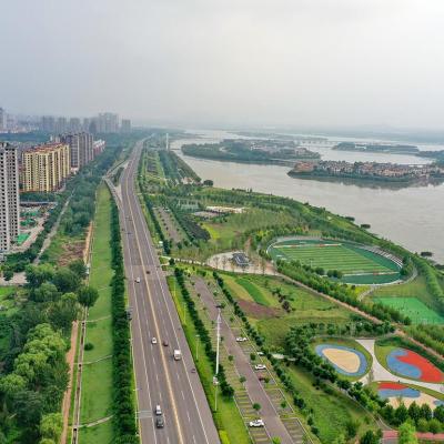 Aerial photo taken on July 31, 2021 shows a vegetation buffer belt at the Huangtaihu Lake water conservation scenic spot in Qian'an City of north China's Hebei Province, as an example of "sponge city construction." Following the principle of precipitation reserving, permeating and clarifying in natural ways, the local authority set out to build a city that "breathes." 