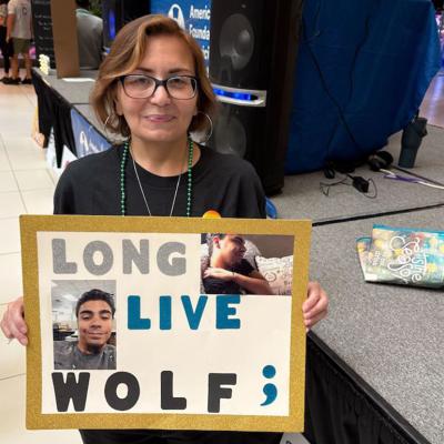 Jessie Edmond holds a photo of her son, Julian 'Wolf' Rivera, who died at 27 in 2019 in Middletown, New York.