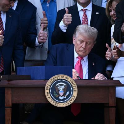US President Donald Trump signs the 'Big Beautiful Bill Act' at the White House in Washington, DC on July 4, 2025. 