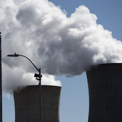 Steam rises out of the nuclear plant on Three Mile Island, with the operational plant run by Exelon Generation, in Middletown, Pennsylvania on March 26, 2019, forty years after the three mile island meltdown.