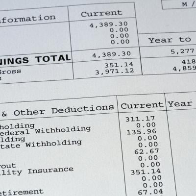 A close up view on a pay stub.