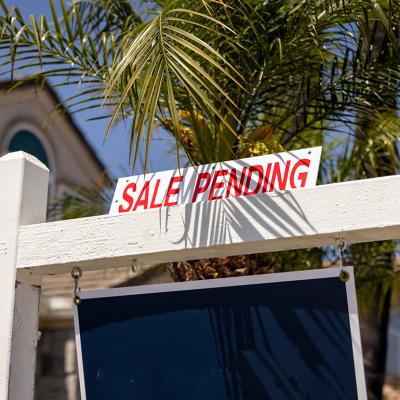 A 'sale pending' sign on a property.