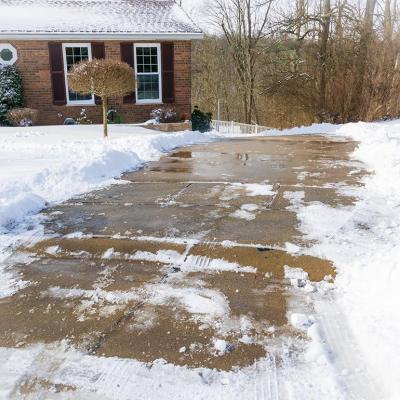 Long, steep, driveway in Kentucky after snow storm, all cleaned up with shoveling and salting. 