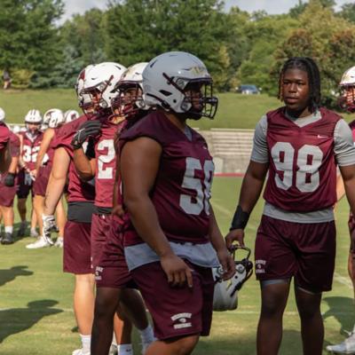 Roanoke College's football players during a practice drill.
