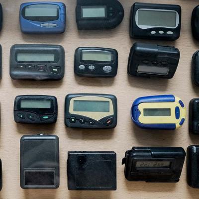 Various types and models of a pager (also known as beepers).
