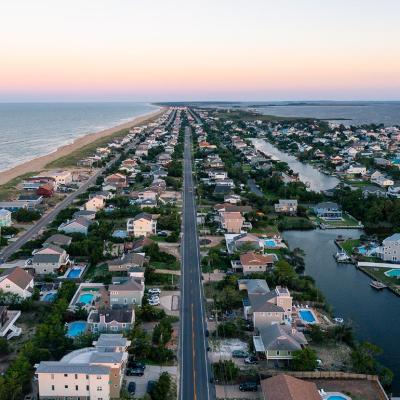 Aerial View looking south of the Sandbridge area of Virginia Beach at Sunset.