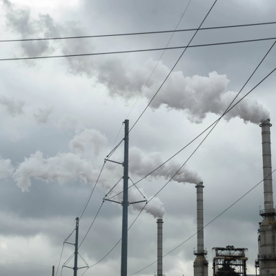 Plumes of smoke rise from three towers at Westlake Chemical's plant in Lake Charles, La. where President Donald Trump recently granted the facility a two-year exemption from stricter air quality standards. Experts say the move will increase toxic and greenhouse gas emissions for the surrounding neighborhoods. 
