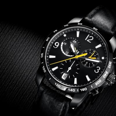 A black luxury watch.