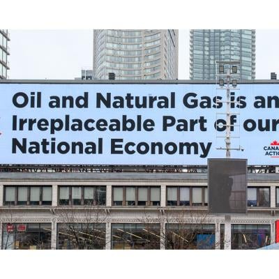 Advertisement sign by Action Canada about the Oil and Natural Gas Industry.