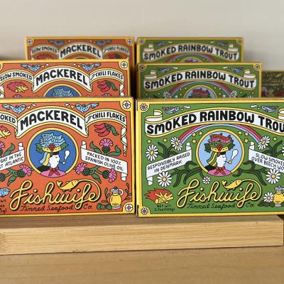 An assortment of Fishwife tinned seafood products on display.