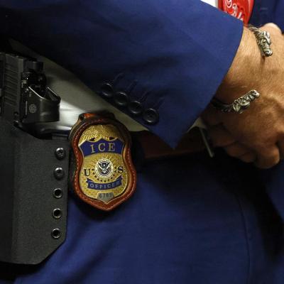  A detail view of the badge worn by deputy assistant director of field operations at ICE headquarters in Washington. U.S. Immigration and Customs Enforcement (ICE) major hiring event in Arlington, Texas.