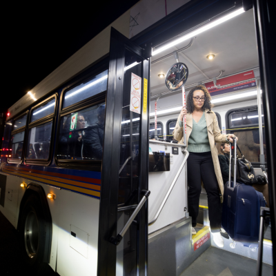 Cherri McKinney rides the bus home from her office in Denver using an EcoPass, a free monthly RTD pass, provided to Colorado state employees.