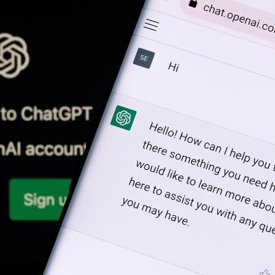 ChatGPT's greeting upon login as seen on a smartphone.