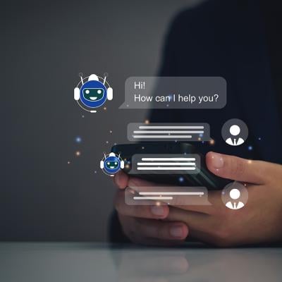 AI chatbot graphics over a person using a smartphone.