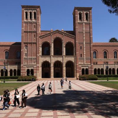 Students walking through Dickson Plaza by the Royce Hall on the UCLA campus in Westwood, California.